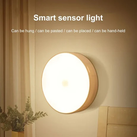 Automatic Smart LED Night Light with body sensor, wireless USB charging, and magnetic suction.